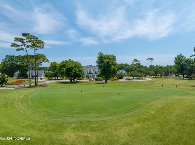 surrounding community featuring a yard