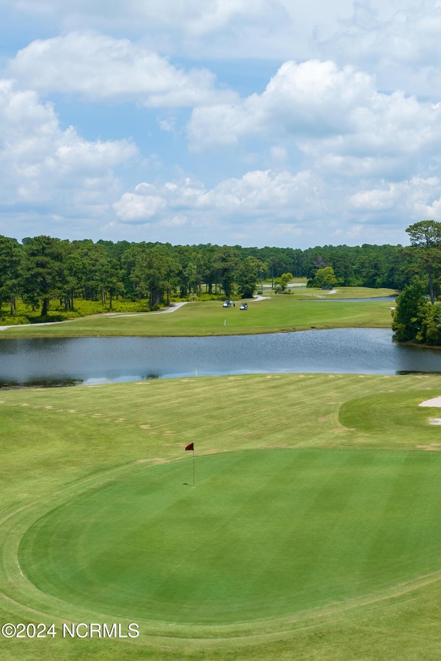 surrounding community with a water view