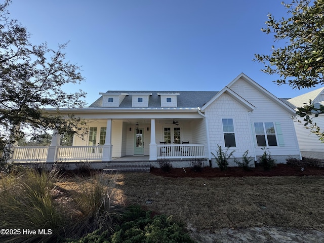 view of front of home with a porch, a shingled roof, and a ceiling fan