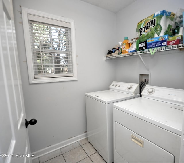 4746 Rail Ct SW, Shallotte, NC 28470 - laundry room featuring washer and dryer and light tile patterned flooring