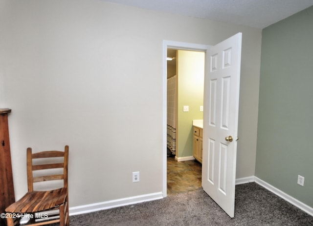 4746 Rail Ct SW, Shallotte, NC 28470 - bedroom with dark colored carpet and baseboards