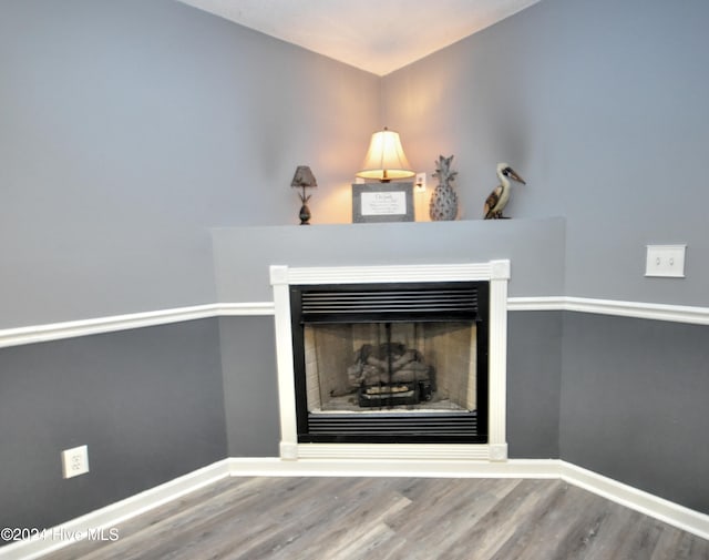 4746 Rail Ct SW, Shallotte, NC 28470 - detailed view of a fireplace and wood finished floors