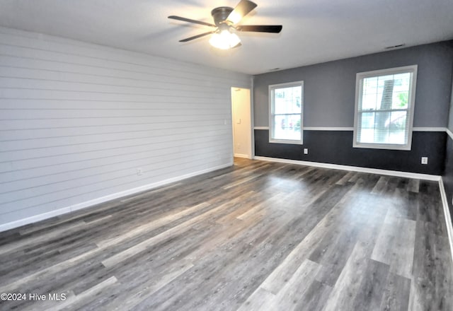4746 Rail Ct SW, Shallotte, NC 28470 - unfurnished room with wood finished floors and a ceiling fan