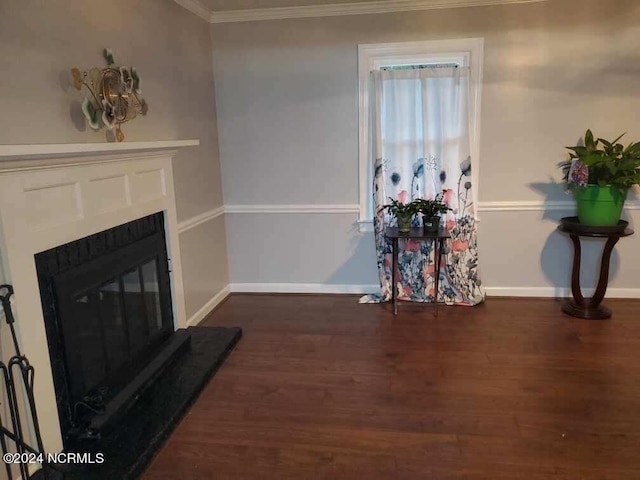 interior space with dark hardwood / wood-style flooring and crown molding