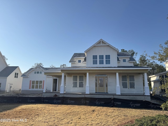 view of front of property featuring covered porch and board and batten siding