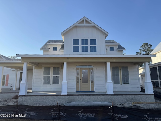 view of front of house with covered porch and board and batten siding