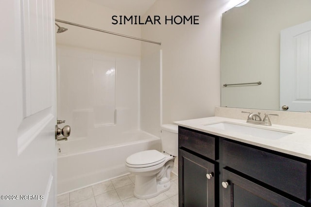 full bathroom featuring vanity, shower / washtub combination, toilet, and tile patterned flooring