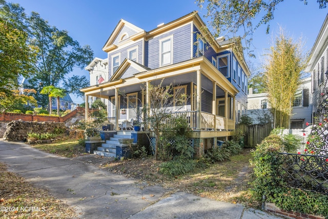 view of front of property featuring covered porch