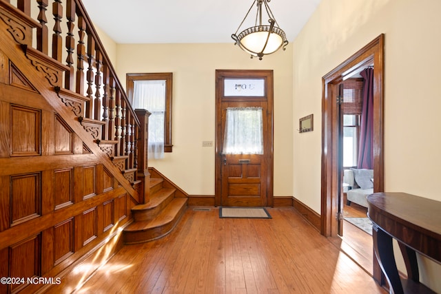 foyer with light wood-type flooring