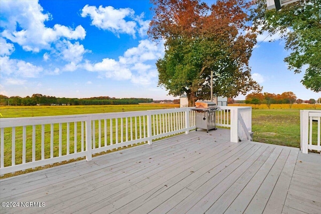 wooden deck with a lawn