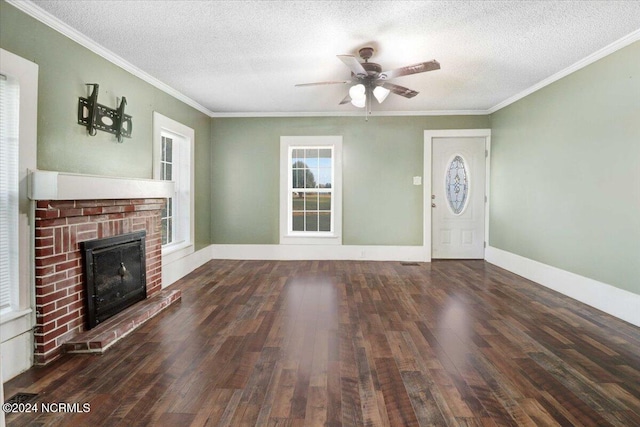 unfurnished living room featuring ceiling fan, a brick fireplace, a textured ceiling, and dark hardwood / wood-style flooring