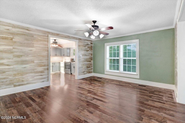 interior space with crown molding, a textured ceiling, wood-type flooring, and ceiling fan