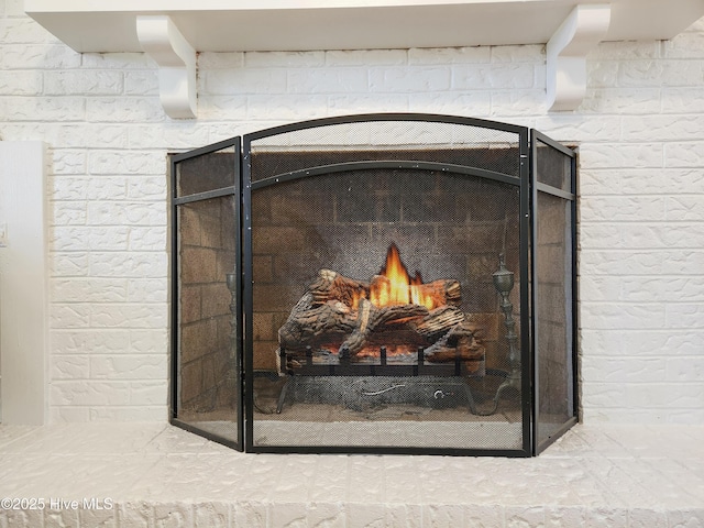 interior details featuring a fireplace