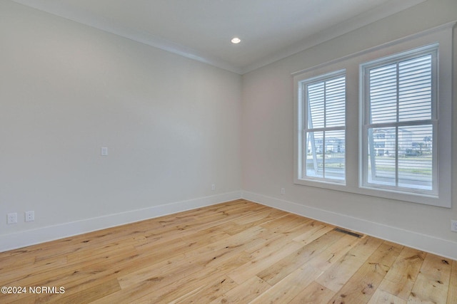 7 S Waterfront Pl, Hampstead, NC 28443 - unfurnished room with recessed lighting, baseboards, ornamental molding, and hardwood / wood-style floors