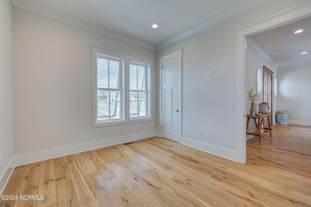 7 S Waterfront Pl, Hampstead, NC 28443 - unfurnished room featuring crown molding, recessed lighting, baseboards, and light wood-style floors