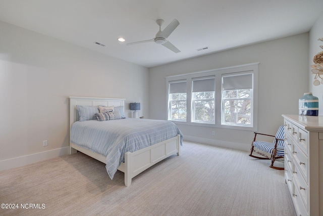 7 S Waterfront Pl, Hampstead, NC 28443 - bedroom featuring visible vents, baseboards, and light carpet
