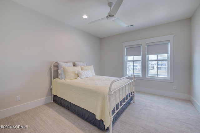 7 S Waterfront Pl, Hampstead, NC 28443 - bedroom featuring visible vents, carpet flooring, baseboards, and ceiling fan