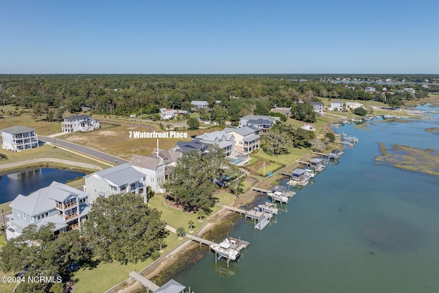 7 S Waterfront Pl, Hampstead, NC 28443 - birds eye view of property with a water view and a forest view