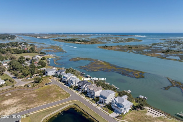 7 S Waterfront Pl, Hampstead, NC 28443 - drone / aerial view featuring a water view and a residential view