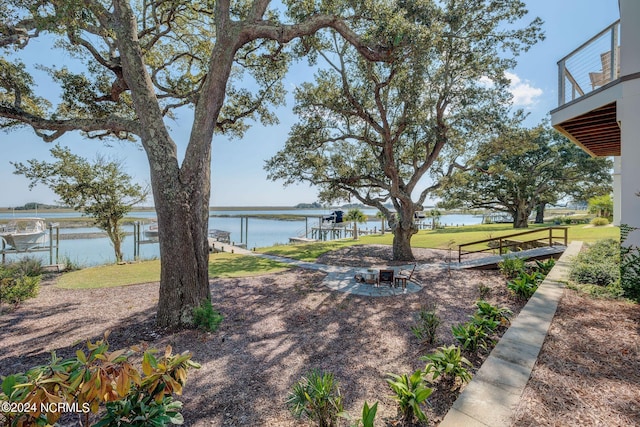 7 S Waterfront Pl, Hampstead, NC 28443 - view of yard featuring a water view and a balcony