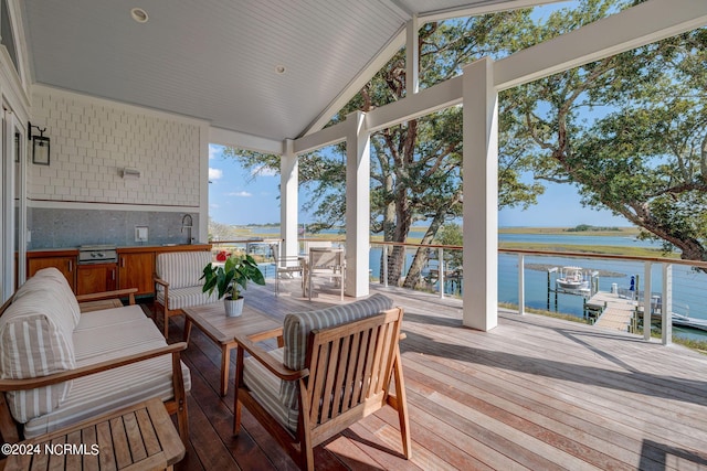7 S Waterfront Pl, Hampstead, NC 28443 - wooden terrace with an outdoor hangout area and a water view