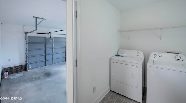 clothes washing area with washer and dryer