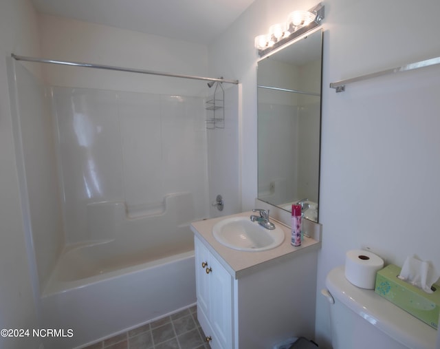 full bathroom featuring bathing tub / shower combination, vanity, and toilet