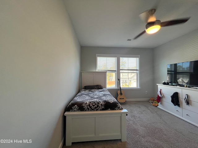 bedroom featuring ceiling fan and carpet flooring