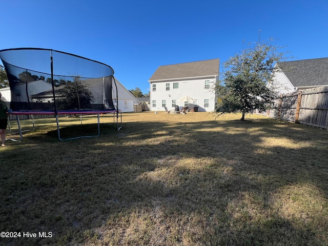 view of yard with a trampoline