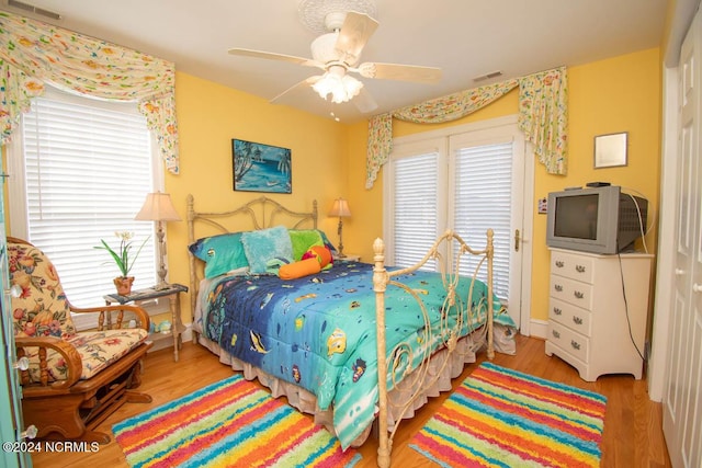 bedroom featuring ceiling fan and light wood-type flooring