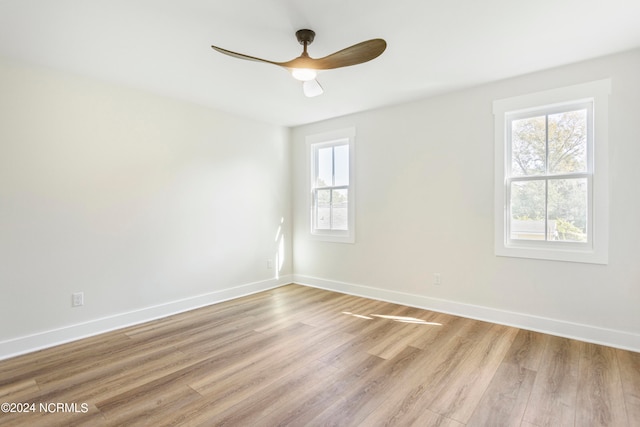 unfurnished room with light hardwood / wood-style floors and ceiling fan