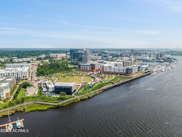 birds eye view of property featuring a water view