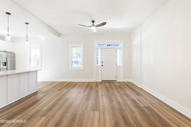 entrance foyer with light wood-type flooring and ceiling fan