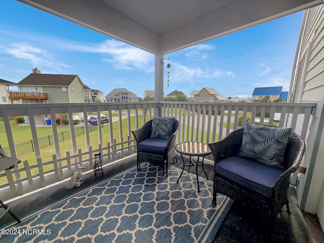 view of patio / terrace with a balcony