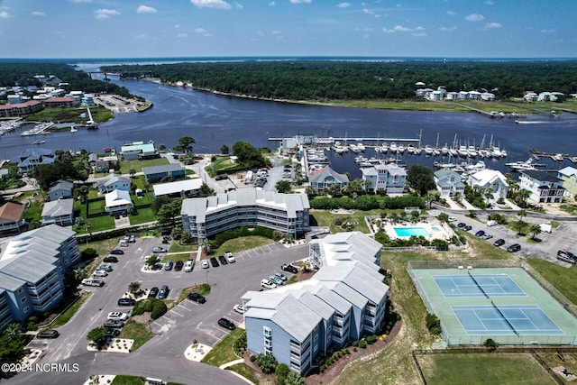 birds eye view of property featuring a water view