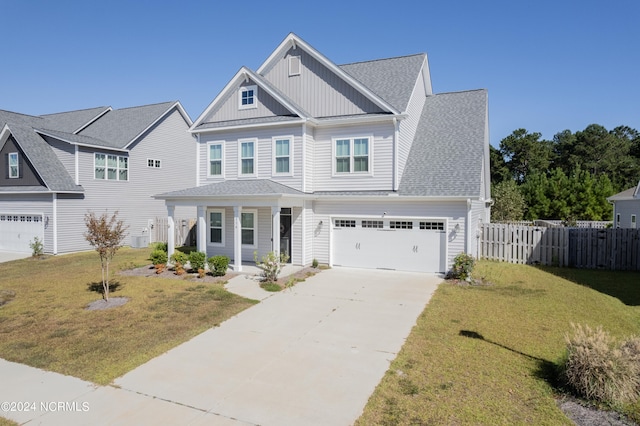 view of front facade featuring a garage and a front lawn