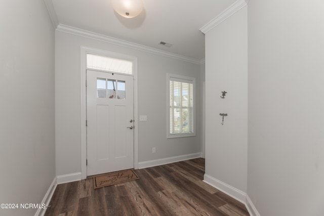 foyer featuring ornamental molding and dark wood-type flooring