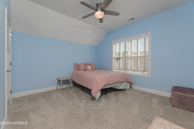 bedroom with light carpet, lofted ceiling, and ceiling fan