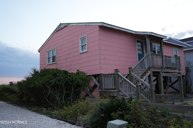 view of property exterior at dusk