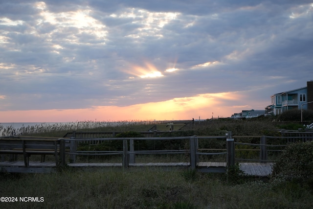 yard at dusk with a rural view