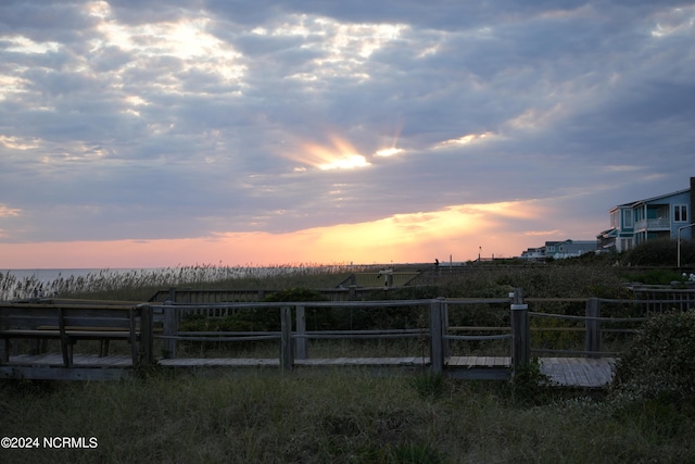 yard at dusk with a rural view