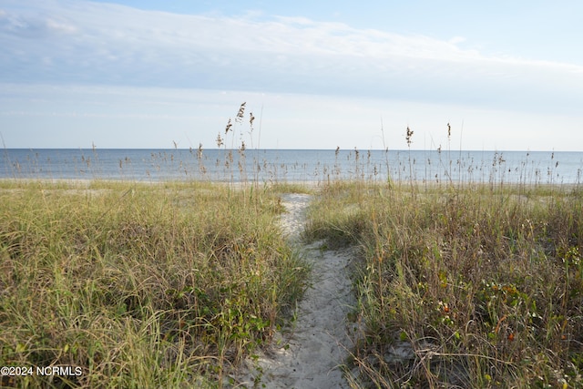 property view of water featuring a view of the beach