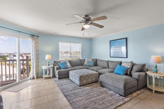 tiled living room with ornamental molding, ceiling fan, and a wealth of natural light