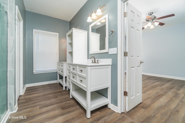 bathroom featuring vanity, wood-type flooring, and ceiling fan