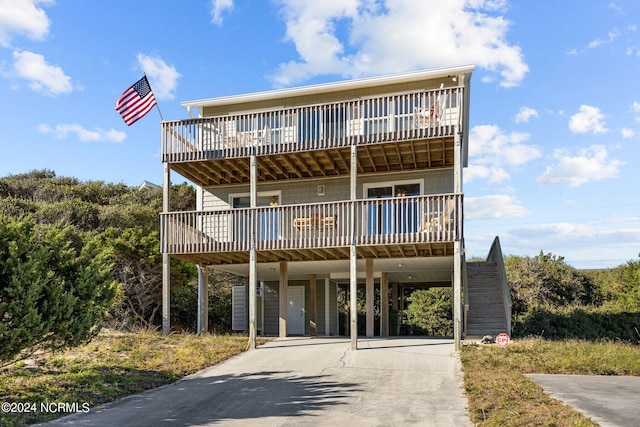 view of front of house featuring a carport