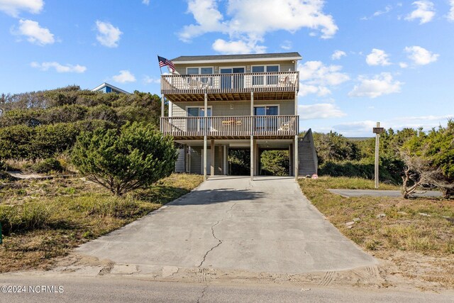 view of property featuring a balcony