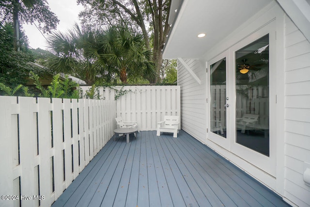 wooden terrace featuring french doors