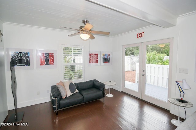 living area with french doors, crown molding, plenty of natural light, a ceiling fan, and wood finished floors
