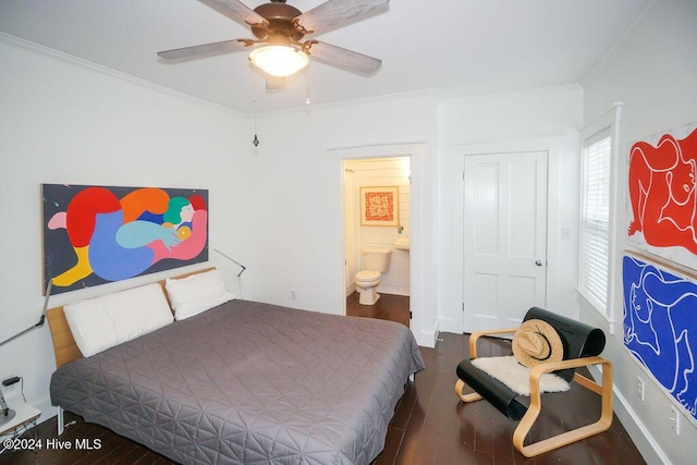bedroom featuring wood finished floors, ornamental molding, ensuite bathroom, and ceiling fan