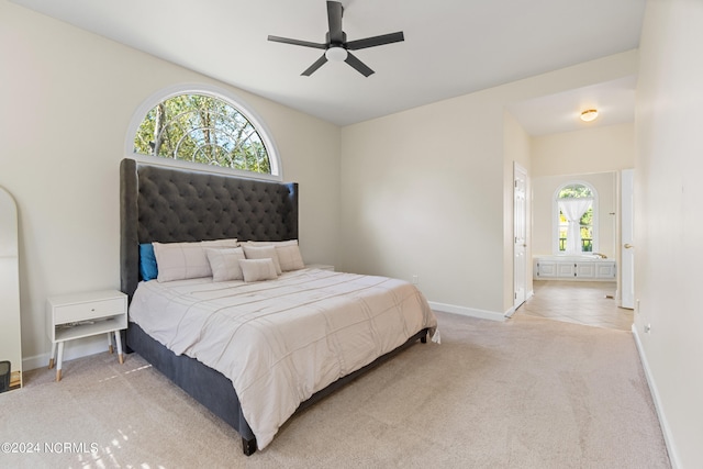 carpeted bedroom with ceiling fan